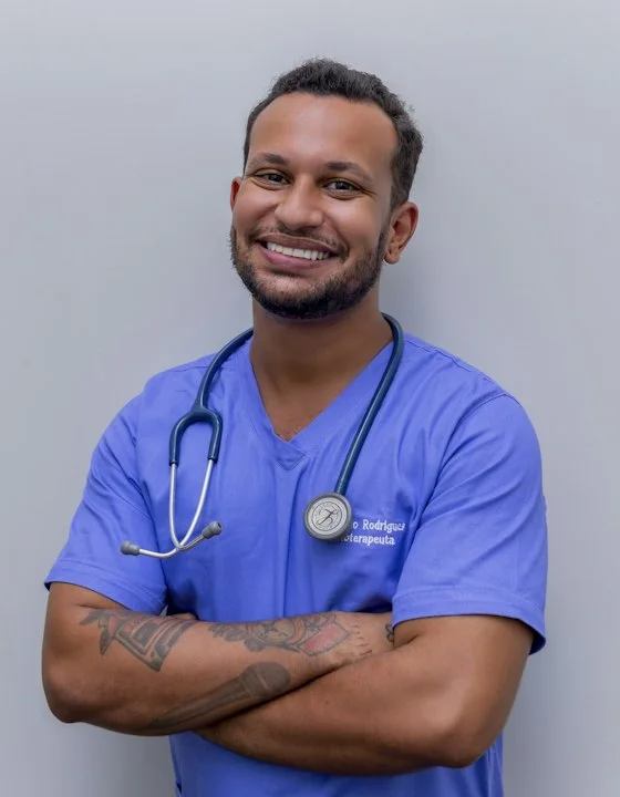 Smiling doctor in scrubs