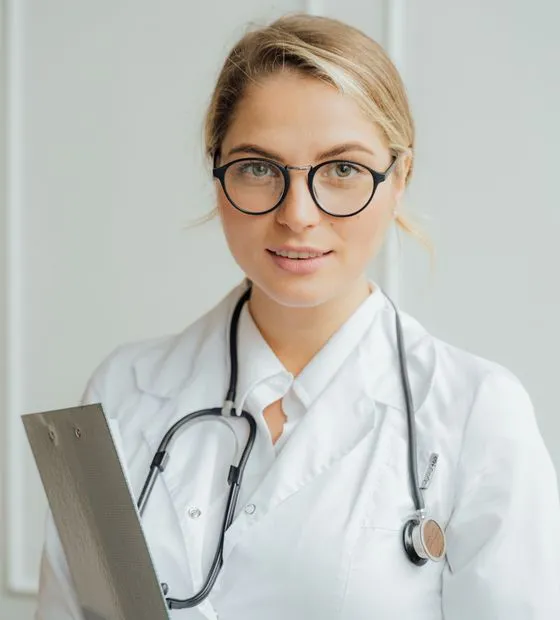 Solo practitioner smiling in clinic
